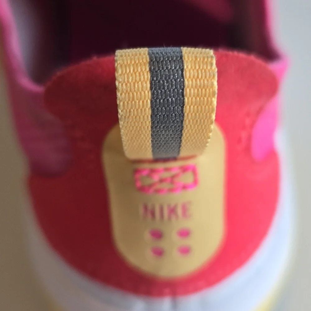 Nike Pink and Yellow Athletic Shoes with Sleek Design - Picture 6 of 6